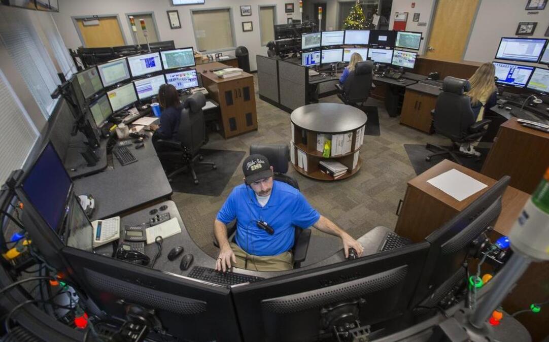 Telecommunicator Jared Runyan and others work in the new 911 call center in O'Fallon. More than six months ahead of a state-mandated deadline, a 911 call center in Fairview Heights has been successfully transferred to O’Fallon as St. Clair County moves closer to being in compliance with a statewide reduction in 911 call centers.