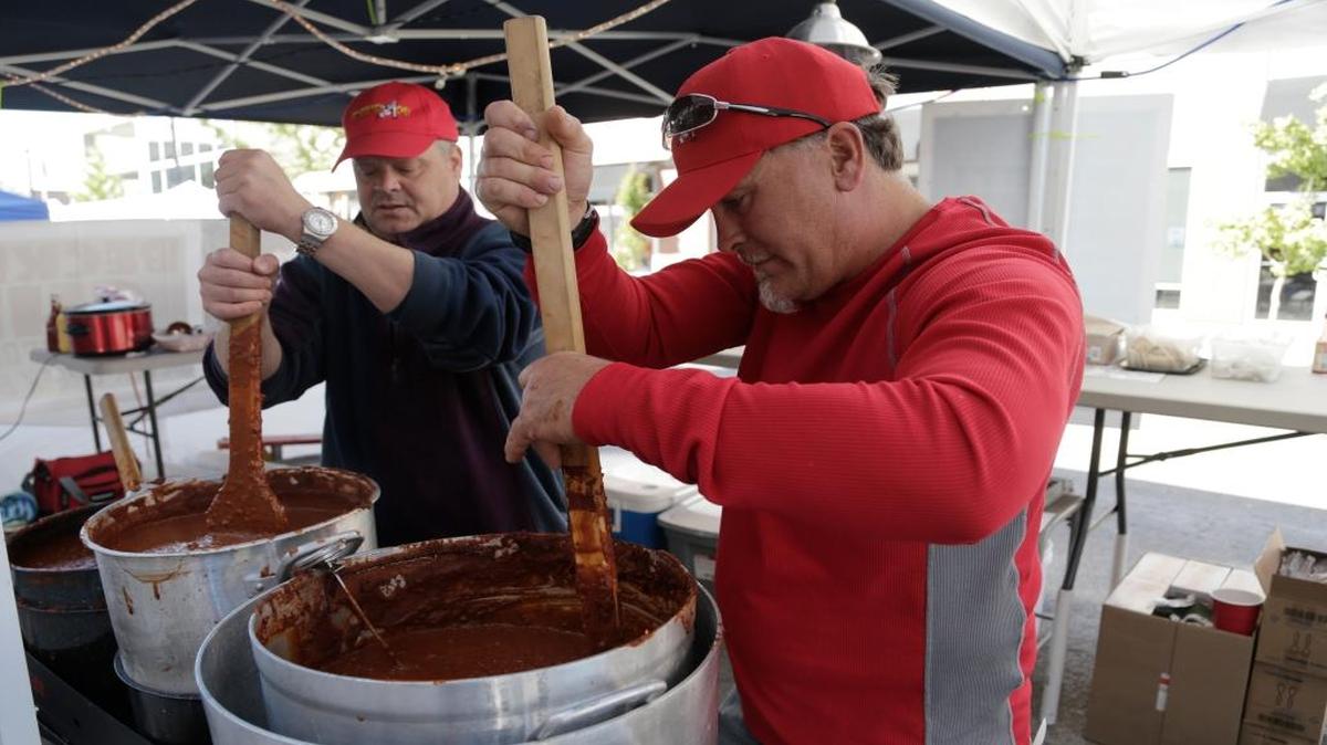 
Charlie Stahlheber and Shawn Beckett stir up some chili at the 32nd Annual Belleville Chili Cook-off on in downtown Belleville.

