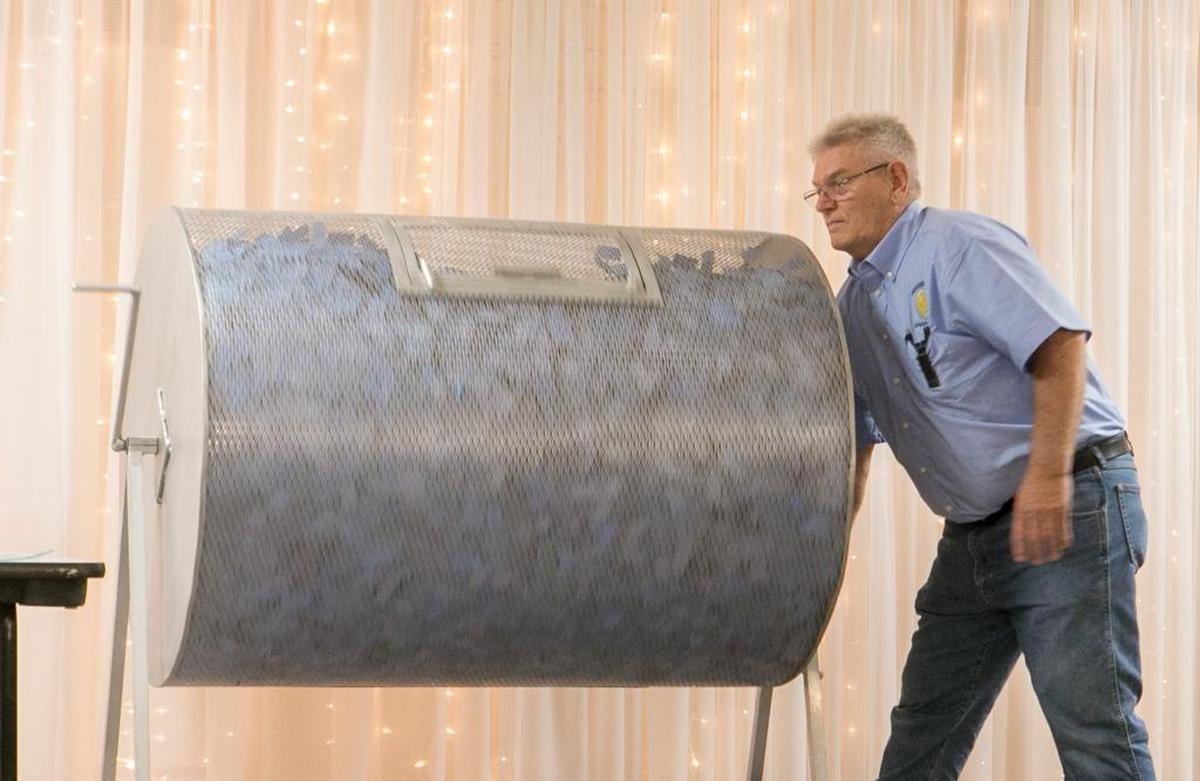 American Legion Post 1239 commander Dale Rakers rotates the drum containing thousands of tickets during the November 8th drawing for $817,822. The prize rolled over for the November 15th drawing.