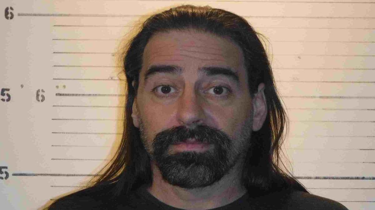 Carl Scoma was arrested on a warrant in connection to seven felony charges from mid-May.