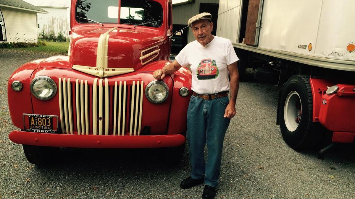 
Delmar Bequette, of New Douglas, with his 1942 Ford truck. Bequette was a truck driver and collects old trucks, showing the restored commercial vehicles. 
