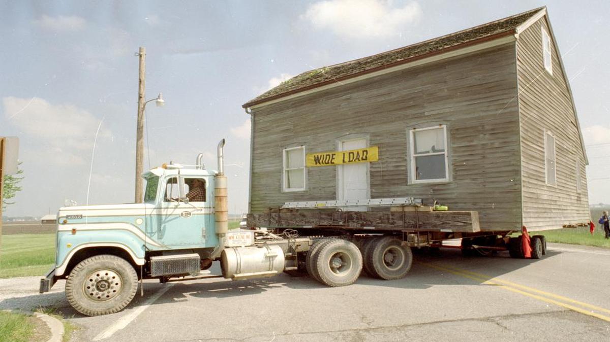 
The 1860s cabin took 90 minutes to be moved from near MidAmerica Airport to Mascoutah's Scheve Park.
