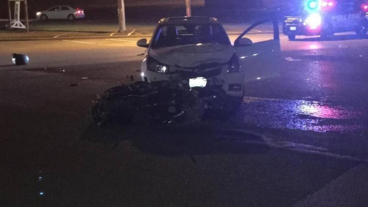 A motorcycle and car collided at 8:49 p.m. Thursday, killing two people, near the intersection of South Belt West and State Street in Belleville.