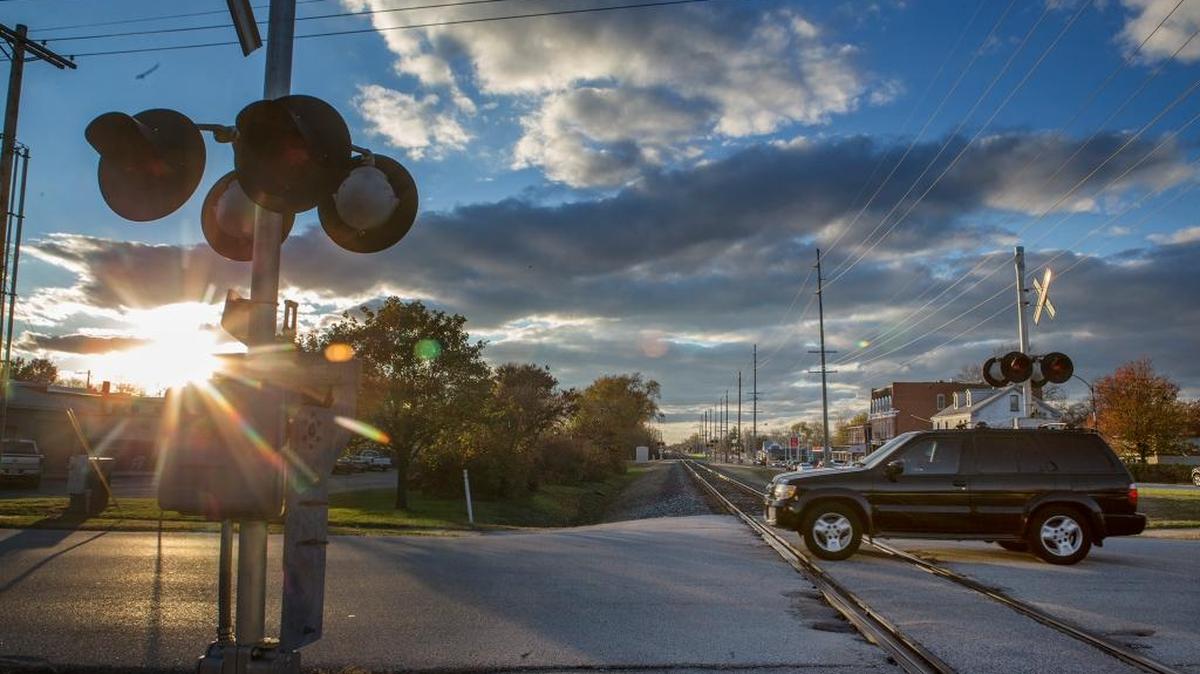 A SUV crosses the tracks at S. Cherry st. in O'Fallon. CSX Railroad has filed for a temporary two-year discontinuation of service of its railroad track route that runs through O’Fallon.
