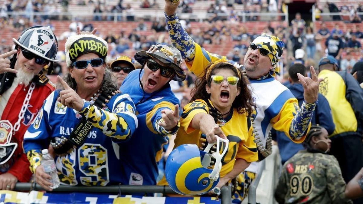 Fans cheer before an NFL football game between the Los Angeles Rams and the Houston Texans Sunday, Nov. 12, 2017, in Los Angeles.