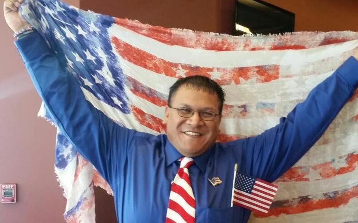 
Saul Aguila celebrates his becoming a U.S. citizen following a naturalization ceremony Thursday morning at the Gateway Center in Collinsville.
