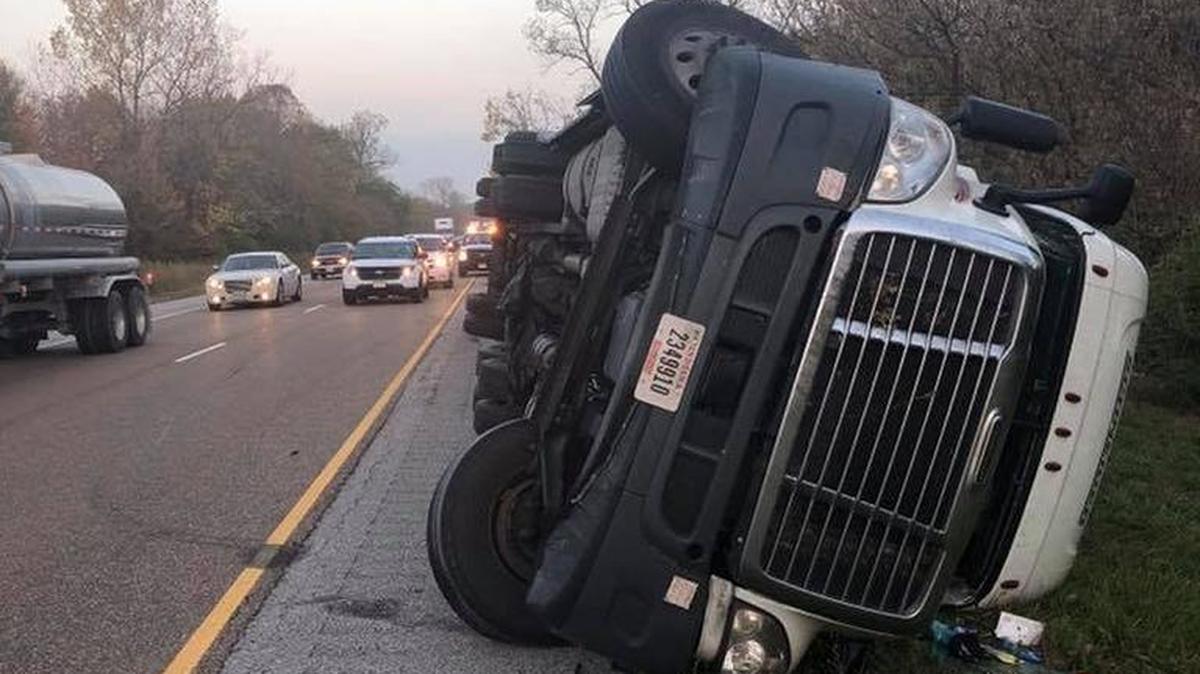 A semi tractor-trailer rolled over Friday morning on eastbound Interstate 64 near Mid America Airport.