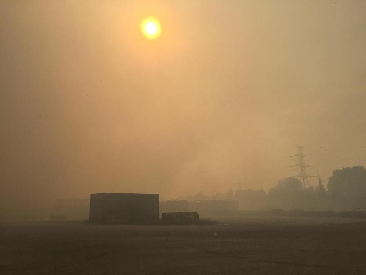 The 50-to 80-acre Oldcastle Lawn and Garden property took on a twilight-like atmosphere as smoke covered the sky.