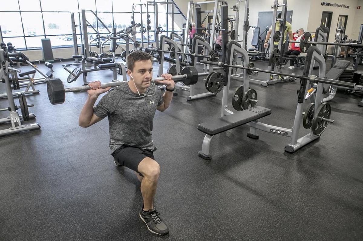 Justin Ponder works out in the East Belleville YMCA fitness center, but he also visits some of the other 24 locations of Gateway Region YMCA while traveling for his job as a U.S. Navy Special Operations scout.