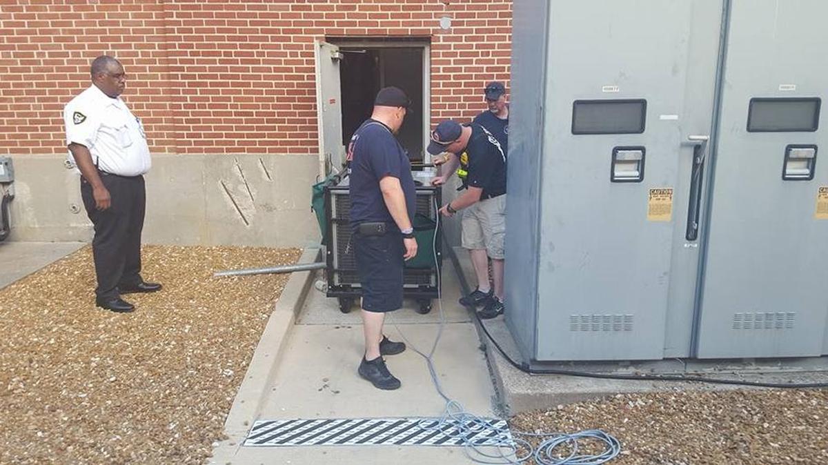 Firefighters and officials worked to cool down Touchette Regional Hospital after the building lost its AC Wednesday afternoon. St. Clair County EMA Director Herb Simmons said officials still remained on scene Wednesday night.