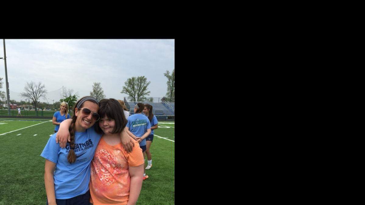 
Alyssa Bartle, left, and Madeline Barton at the soccer practice that Belleville East’s team had with the H.O.P.E. club in April. H.O.P.E. stands for Helping Other People Excel.
