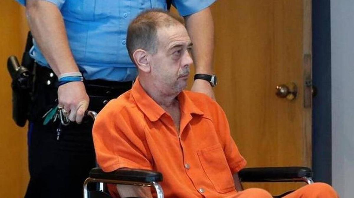 Kevin Helfrich is wheeled out of the courthouse by a St. Clair County deputy Nov. 9 after appearing for an arraignment.