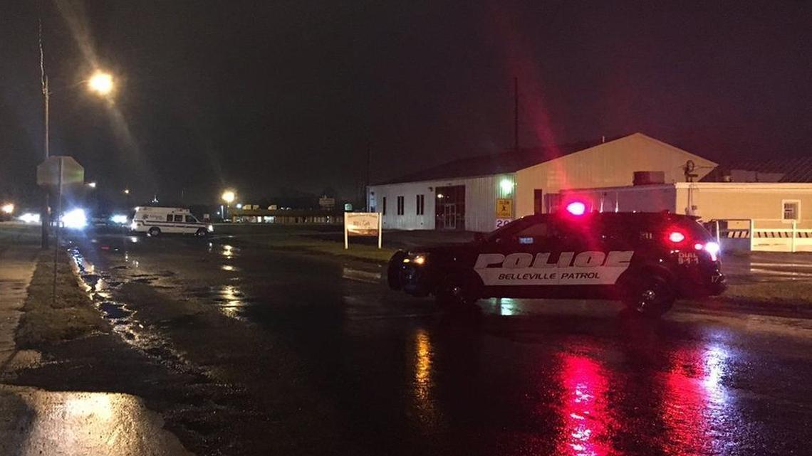 A police car parked near Emge Junior High School Tuesday morning, following reports a body had been found in the area.