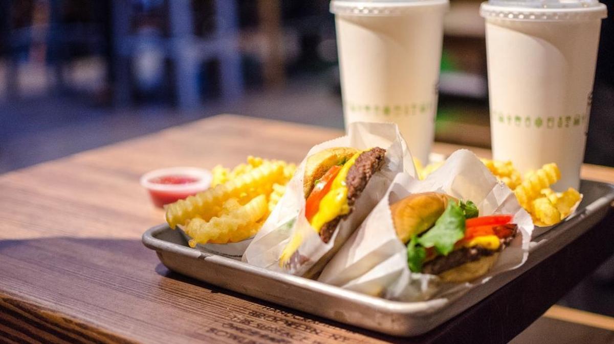 Burgers and fries from Shake Shack. The chain will open its first St. Louis location Dec. 11 in the Central West End.