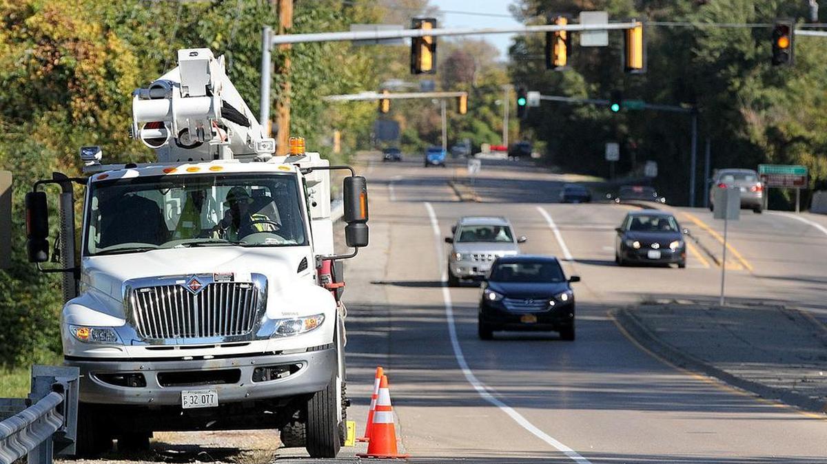 
An Ameren Illinois truck is parked on Illinois 157 Sunday near the site of a crash with a power pole that caused power outages in Collinsville.
