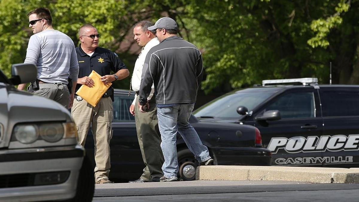 Illinois State and Caseyville Police outside the Rodeway Inn last month in Caseyville.