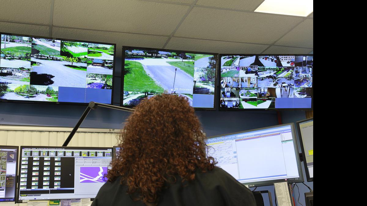 
Fairview Heights Police telecommunicator Tessa Keys watches three large-screen monitors that show activity at Moody Park, Pleasant Ridge Park, and cameras around the city hall and police station complex. This is a newly-redesigned area for the telecommunicators to work from, secured inside the police department building.
