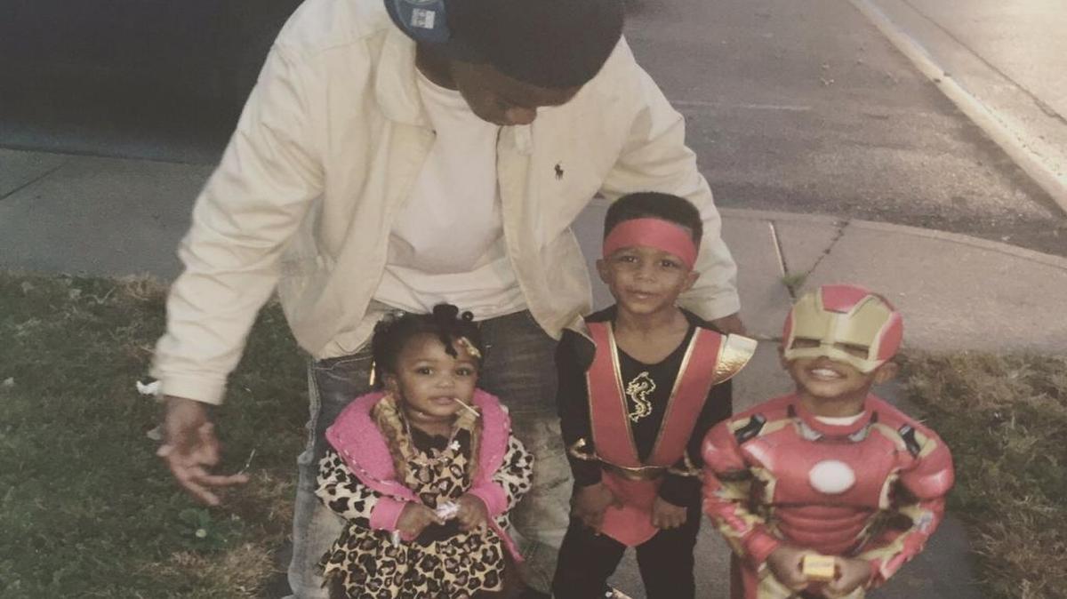 DeAngelo Oliver with three of his children at Halloween.