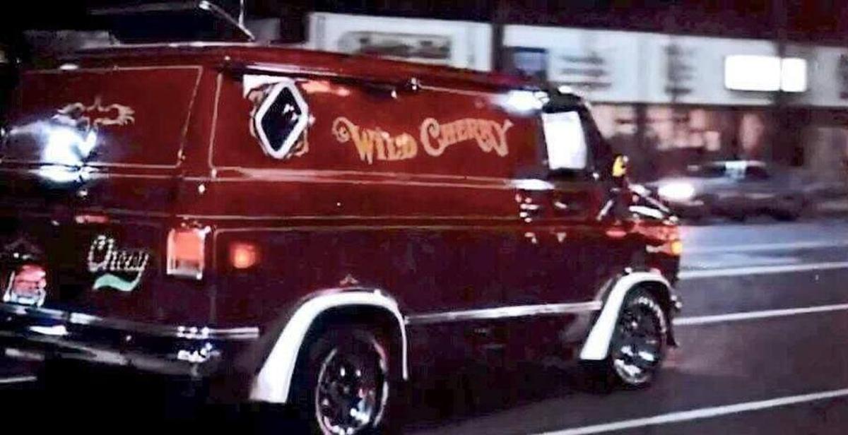 This screen shot from the 1979 hot-rod movie “Van Nuys Blvd.” shows a Chevy G-10 van, known as the “Wild Cherry,” cruising the strip in the San Fernando Valley of Los Angeles County.