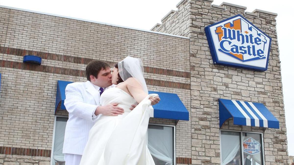 
News-Democrat photographer Derik Holtmann won a second-place award in the picture-story category for his coverage of a wedding at White Castle.

