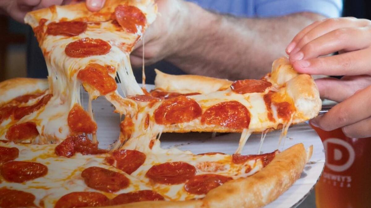 A look at the pepperoni pizza at Dewey’s Pizza.