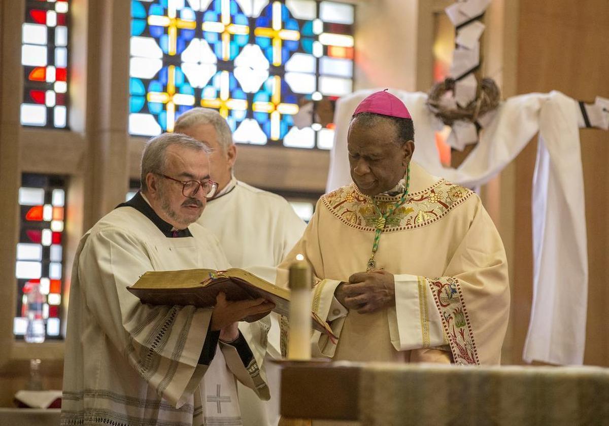 Monsignor John T. Myler and Bishop Edward K. Braxton, of the Catholic Diocese of Belleville, celebrate Mass at St. Elizabeth’s Hospital in Belleville for Colleague Recognition Week in 2015.