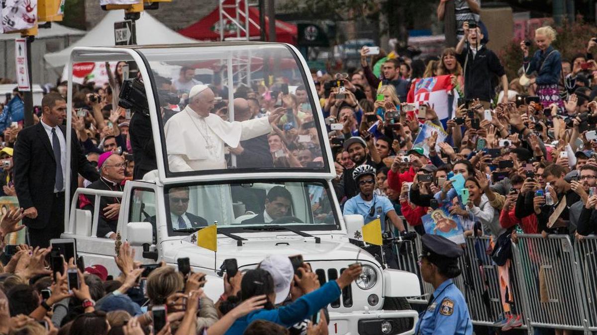 
Pope Francis waves to the crowd from the popemobile during a parade Sunday in Philadelphia. 
