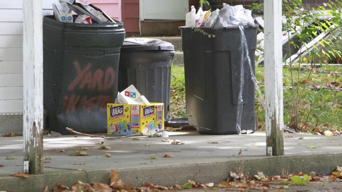 Can you toss trash in your neighbor’s can in Illinois? Here’s the law