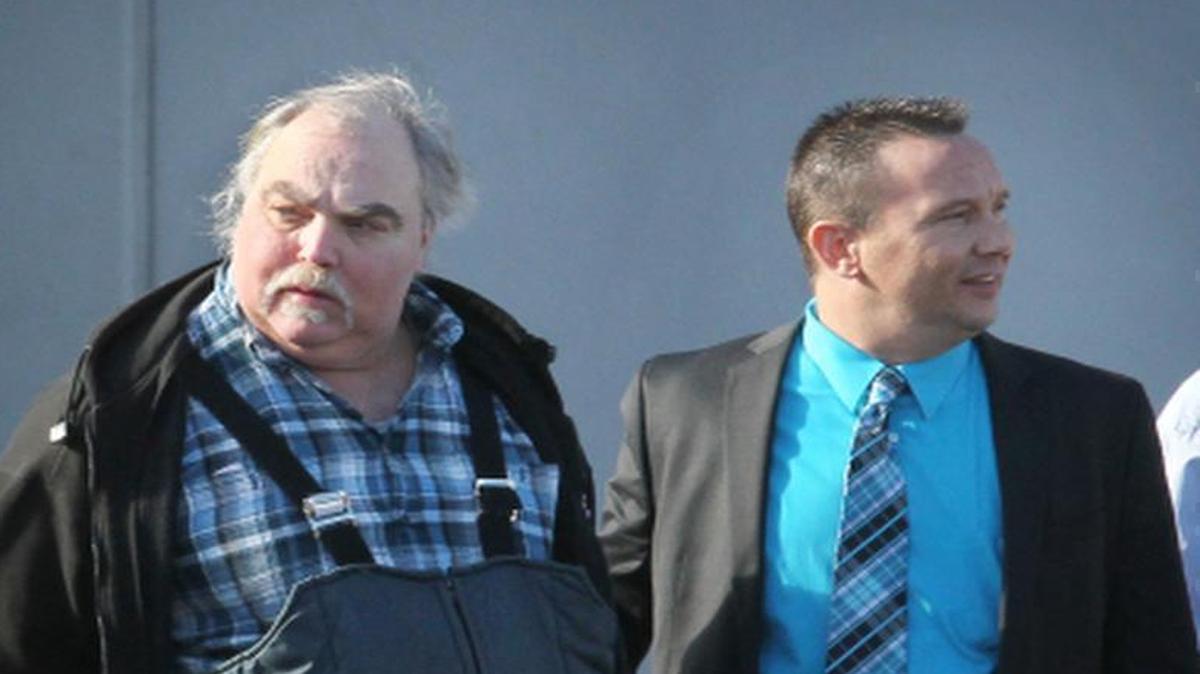 
George H. Bricking Jr., left, was arrested in 2013 at his place of employment, a meat company located in Sauget.
