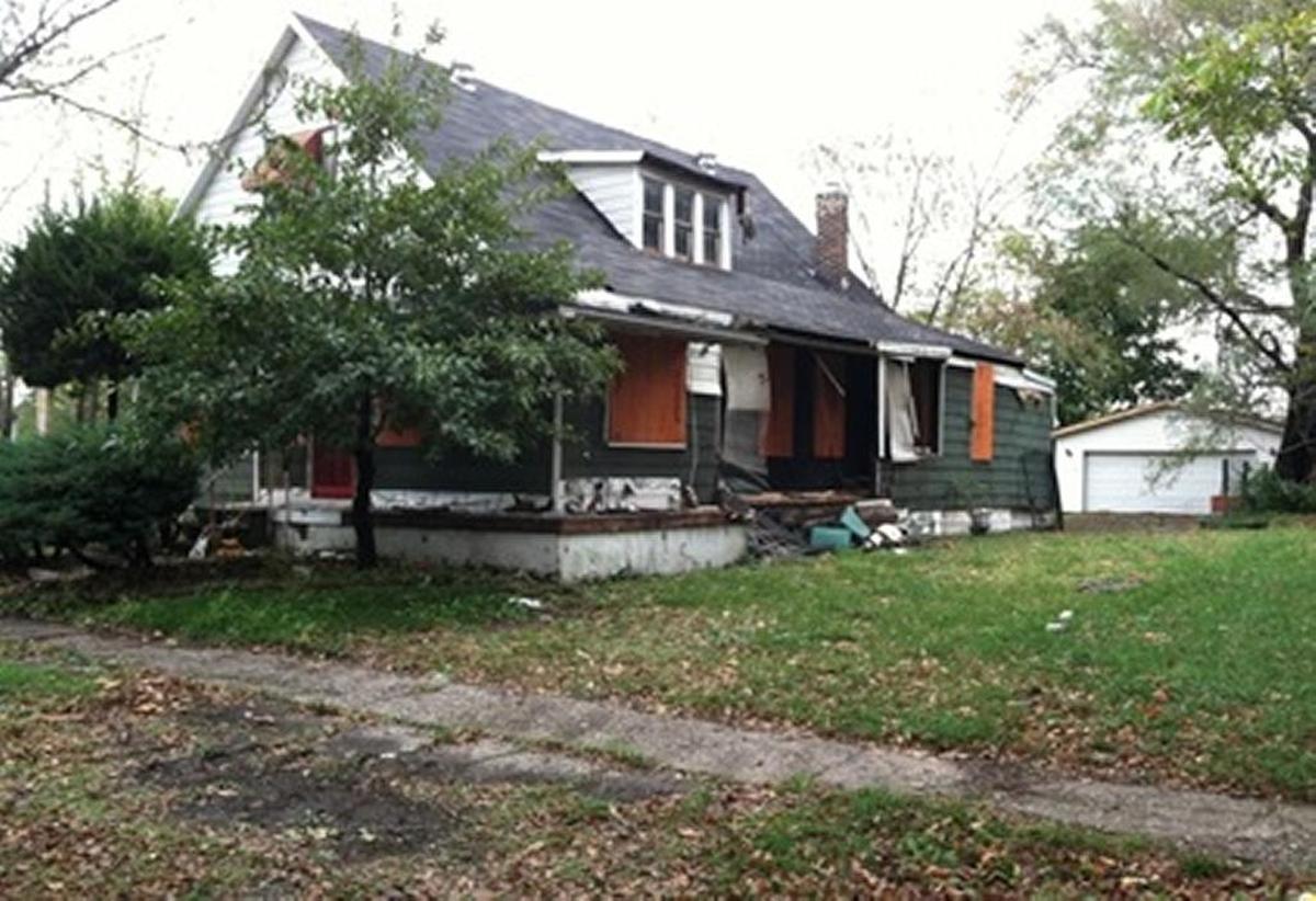 Miles Davis’ boyhood home when it was in a vandalized state.