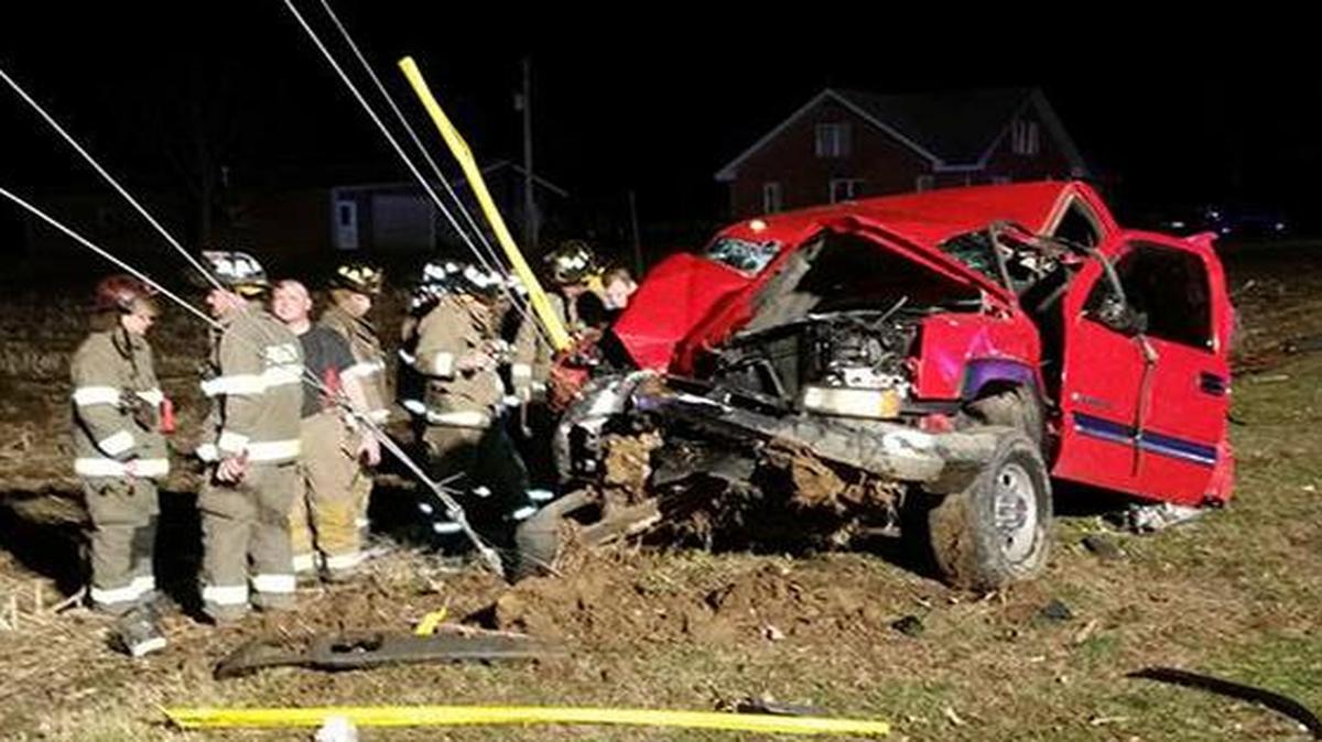Firefighters at the wreckage of the vehicle last weekend.