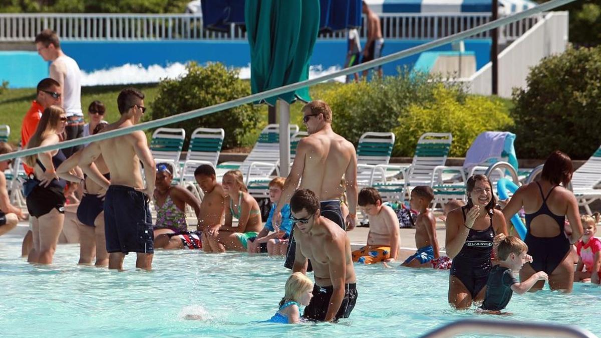 Swimmers and lifeguards enjoy the day at Splash City Family Waterpark in Collinsville. Weather forecasters are predicting a hotter-than-normal summer.