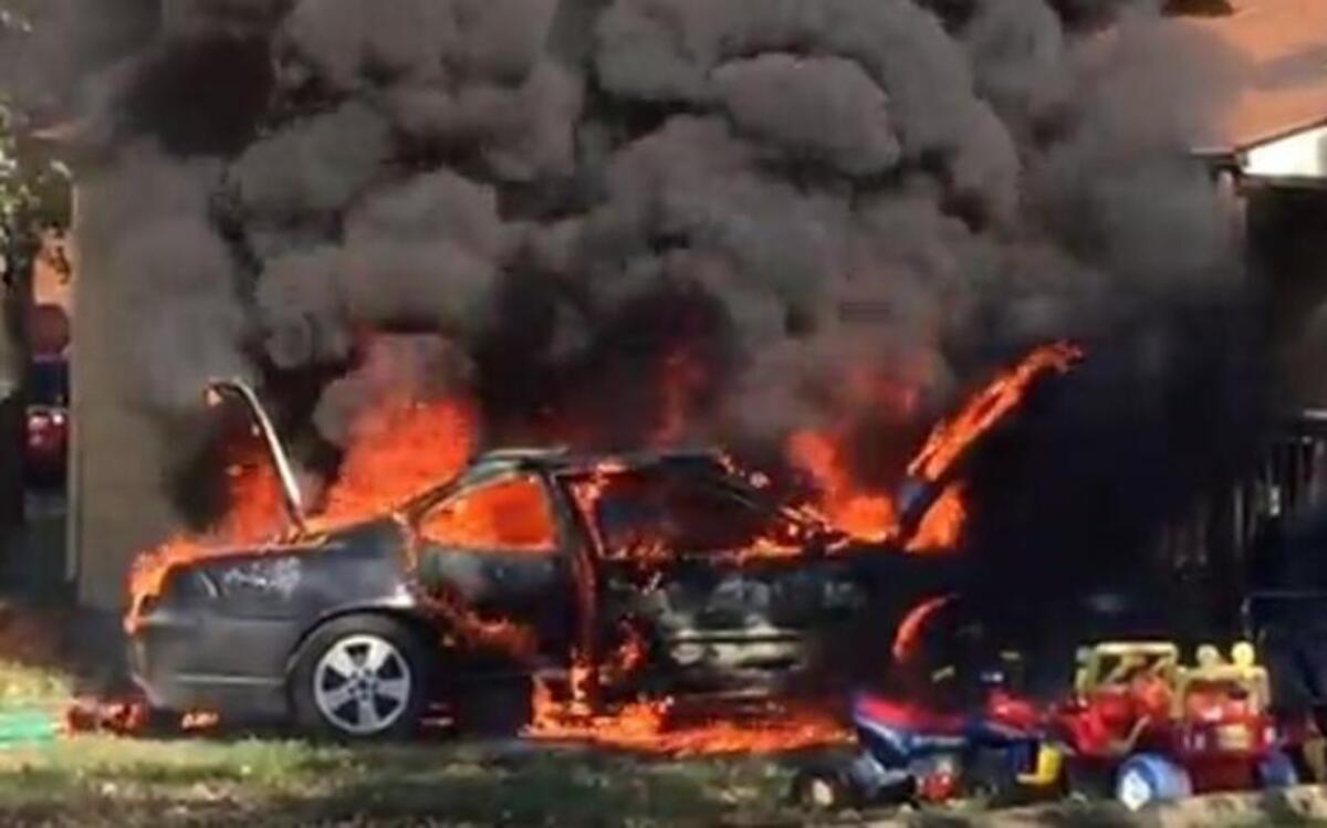 A man was inside his 1997 Pontiac Grand Prix when it exploded, but narrowly escaped with only a few singed hairs.