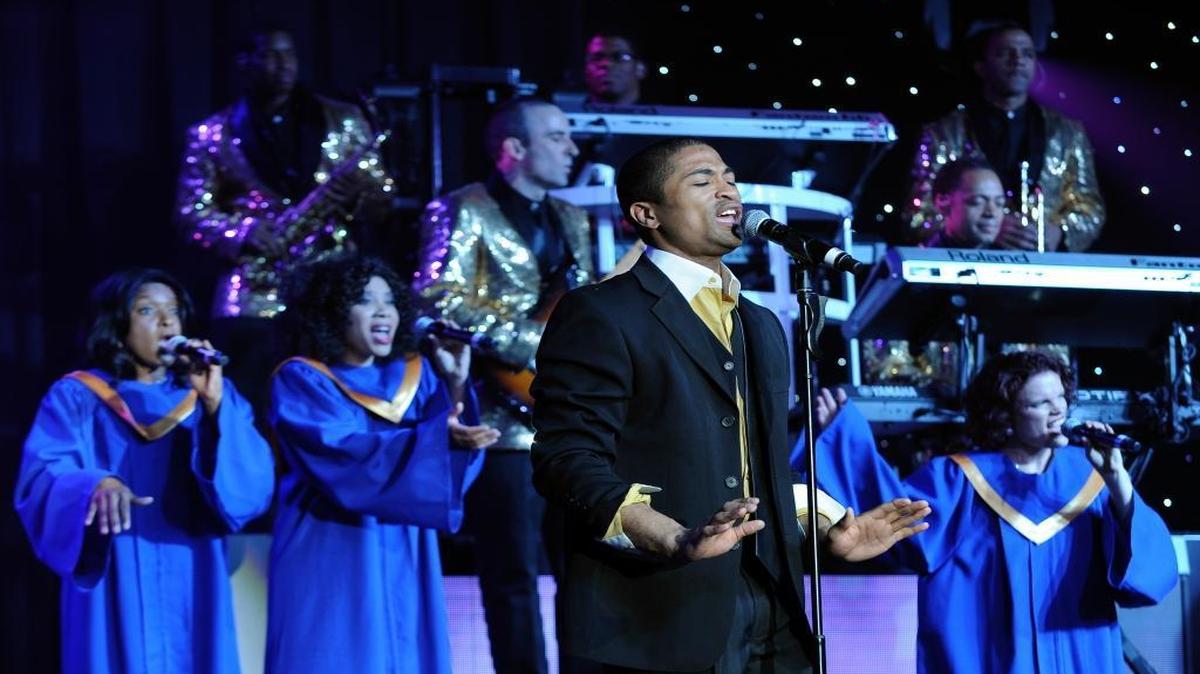 U.S. Air Force Senior Airman Charles Cooper, Whiteman Air Force Base, Mo., sings “All of Me” with fellow Airmen during the Tops in Blue’s 60th Anniversary Tour in 2014 at the Abilene Civic Center in Abilene, Texas. With a vision created by Maj. Alvin Reilly, Tops in Blue began in 1953 to recognize the high caliber of amateur entertainment available within the Air Force.
