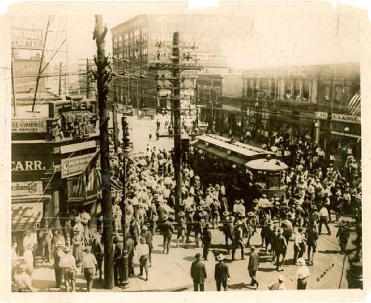 A white mob surrounds a streetcar before pulling off black passengers and beating them in the 1917 race riot in East St. Louis. Estimates on the July 2 death toll range from 48 to 200. More than 250 buildings were burned.