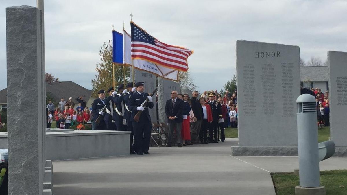 An honor guard from the O'Fallon Air Force ROTC presents the colors.