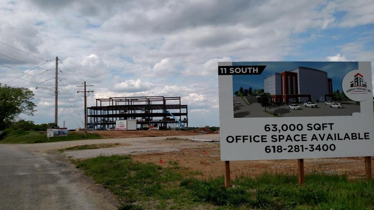 Steel beams form the skeleton of what soon will be a 63,000-square-foot office building off Sand Bank road in Columbia. Several of the building’s future tenants have been named.