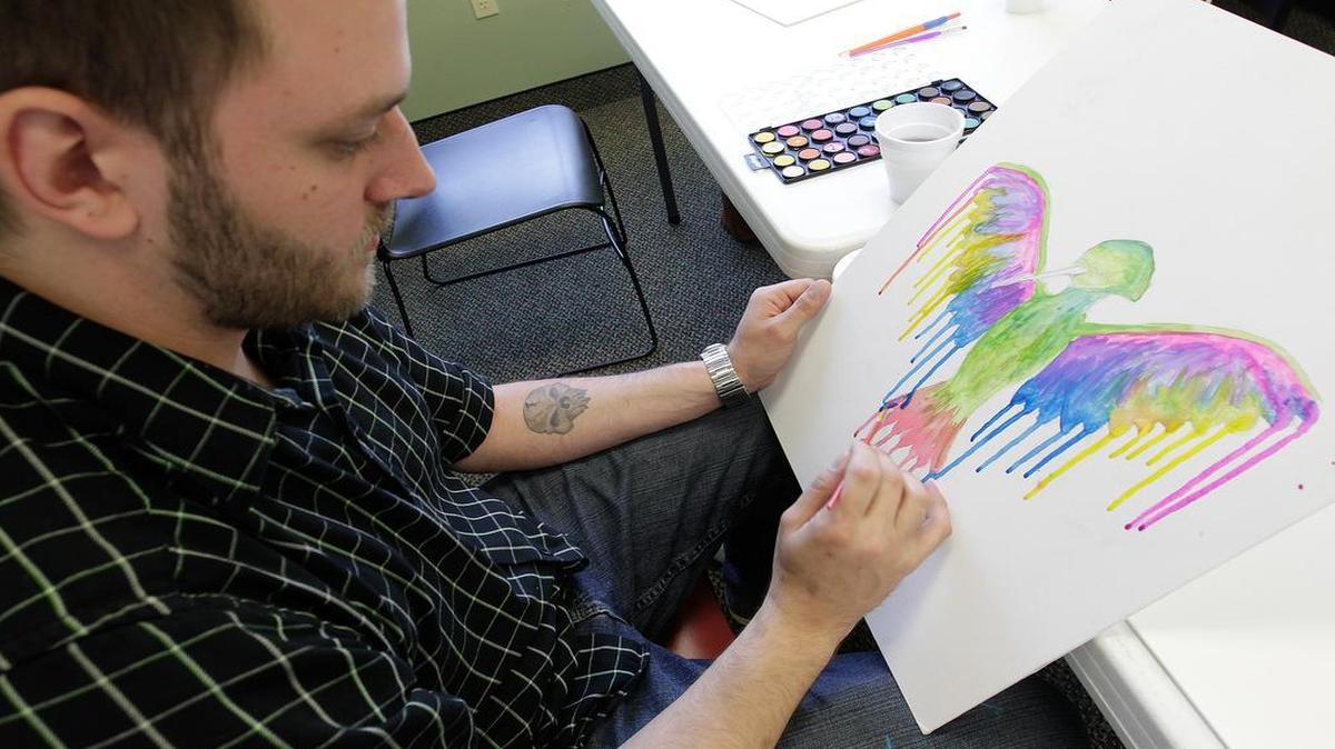 
Cancer survivors, fighters, and thrivers - paint what is their happiest thought to them, from a previous, current or future experience. The event took place at the Cancer Care Center on Tuesday in Swansea and drew about a dozen people. Shay Mayweather, Miss Missouri SuperNational, thought up the project and worked with the Center's staff to make it a reality. The paintings will be auctioned off at the Crown Room at BallPark Village, with proceeds going back to the Cancer Care Center. Landry Westrich of St. Louis draws a hummingbird. 
