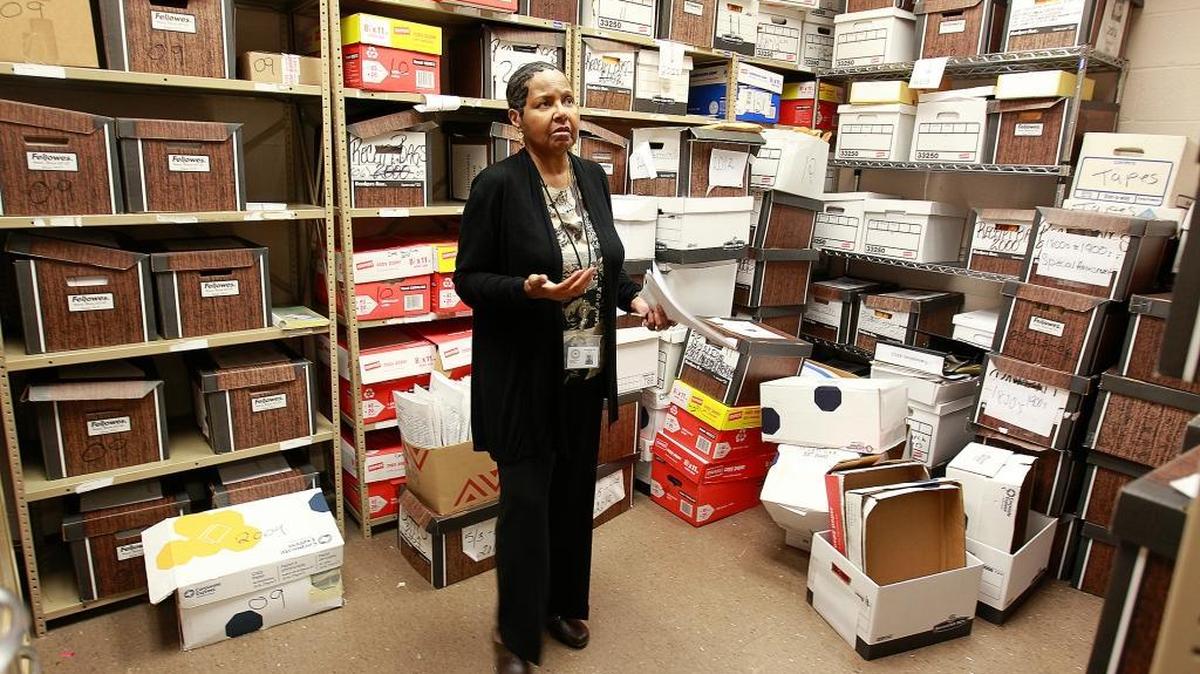 
Current East St. Louis Treasurer Charlotte Moore stands inside the storage vault where many years of city records are stored. About a half hour before this photo was taken, FBI Special Agent Charles A. Willenborg, of the FBI's Fairview Heights office, served a subpoena to Moore asking her to appear in Federal Court with city paperwork from a period of time before she was treasurer. A predecessor -- Joe Lewis -- was the treasurer during the years the subpoena covers. 

