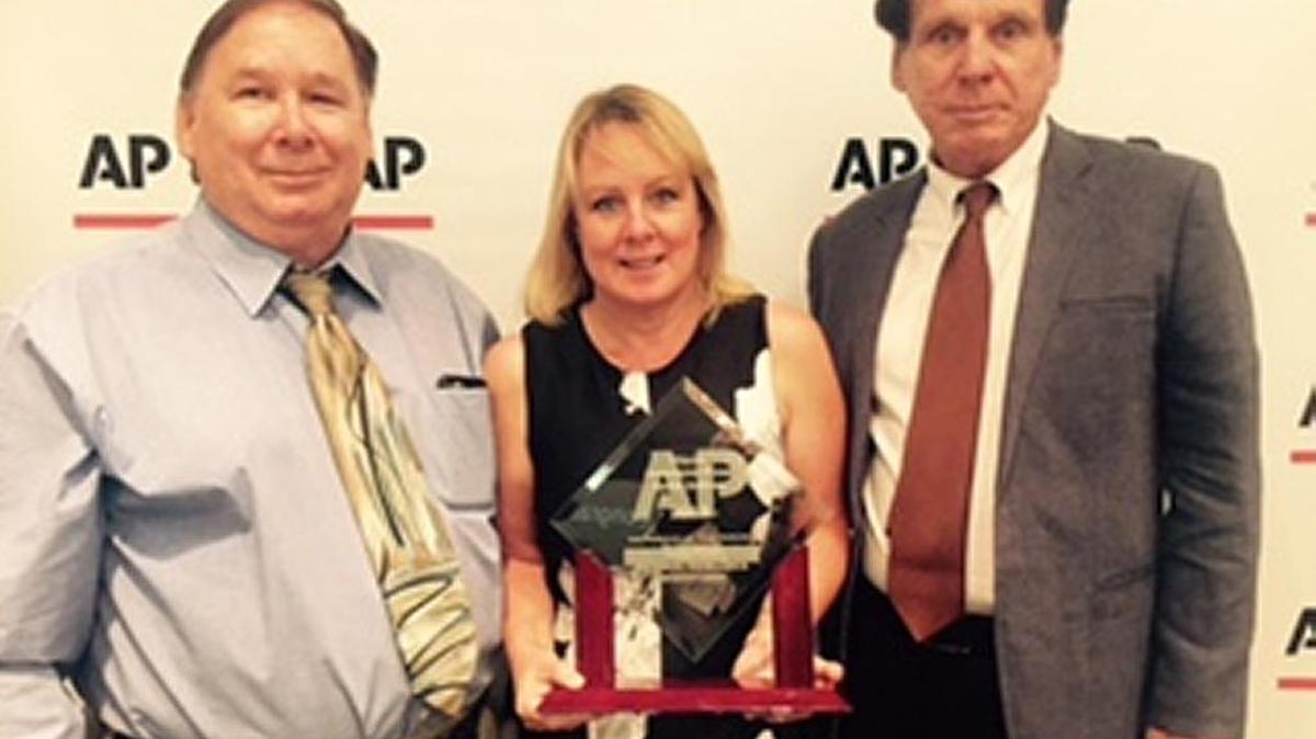 Belleville News-Democrat City Editor Gary Dotson, left, and reporters Beth Hundsdorfer and George Pawlaczyk.