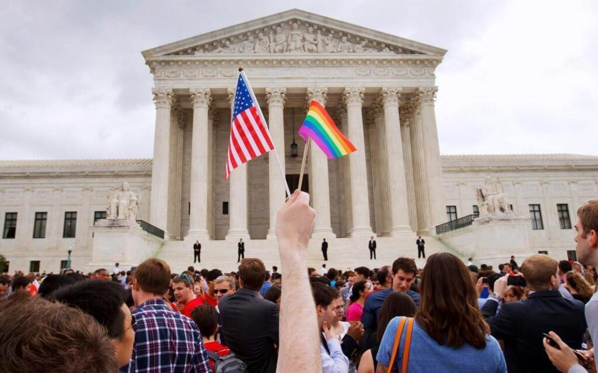 
A crowd celebrates on June 26 outside of the Supreme Court in Washington after the court declared that same-sex couples have a right to marry anywhere in the U.S.

