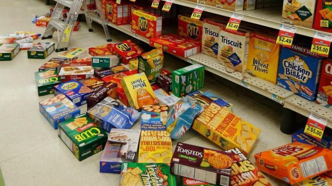 Kyndra Richards cleans up at White’s Foodliner after an early-morning earthquake in Pawnee, Oka., on Saturday. The United States Geological Survey said a 5.6 magnitude earthquake happened Saturday morning in north-central Oklahoma, on the fringe of an area where regulators had stepped in to limit wastewater disposal. That temblor matches a November 2011 quake in the same region.