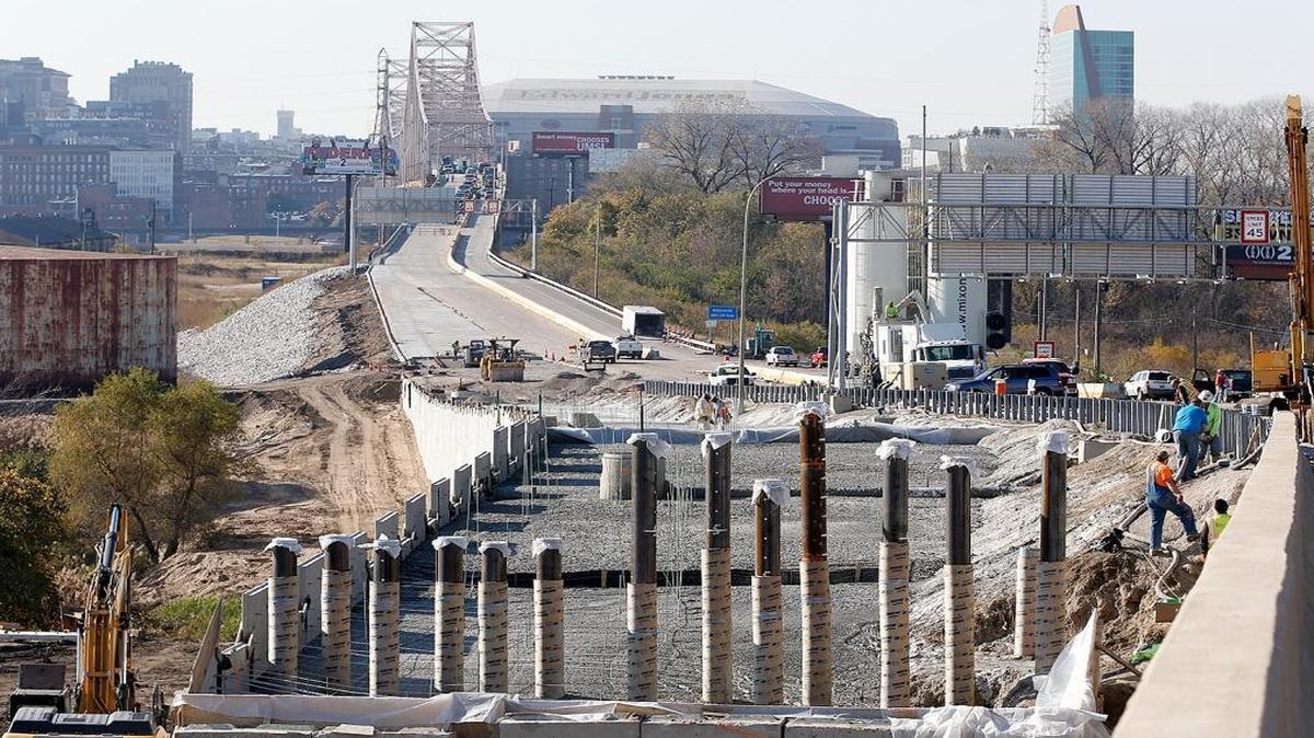 Concrete is poured as the Illinois 3 connector is completed to provide access to the MLK Bridge from the Illinois side.