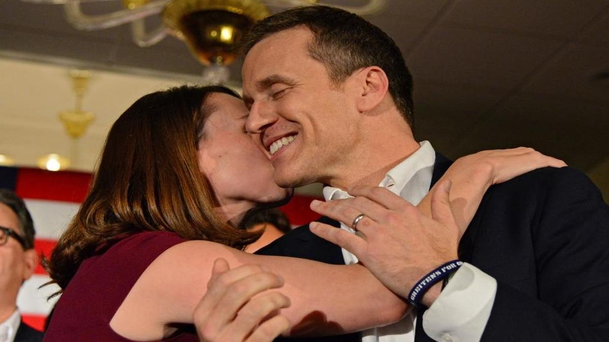 Missouri Republican Governor-elect Eric Greitens hugs his wife Sheena as he delivers a victory speech. Sheena Greitens was robbed Monday at gunpoint near their St. Louis home in the Central West End.