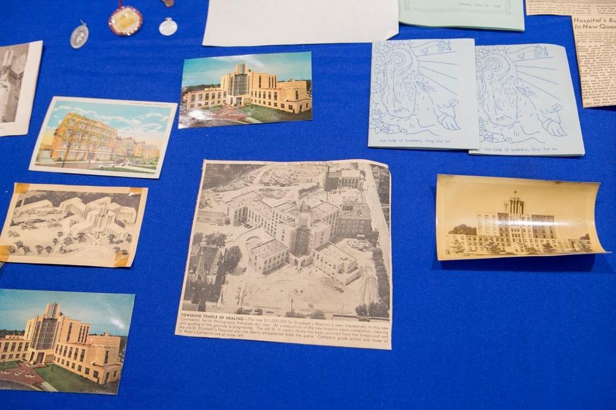 Some of the many items that were inside a time capsule found in front of the old hospital in Belleville near the St. Elizabeth's statue. The items from the time capsule will be on display through May 2018 at St. Elizabeth’s Hospital with other historical artifacts and photos in the Heritage Wall, located on the main/first level behind Outpatient Registration. In the coming months, colleagues of St. Elizabeth’s will be asked to submit their ideas on what items should be included in a new time capsule at the O’Fallon hospital. In May, during National Hospital Week, the old time capsule items will be repackaged and added into the new time capsule along with the newly added items. All will be placed in a location near the Heritage Wall.