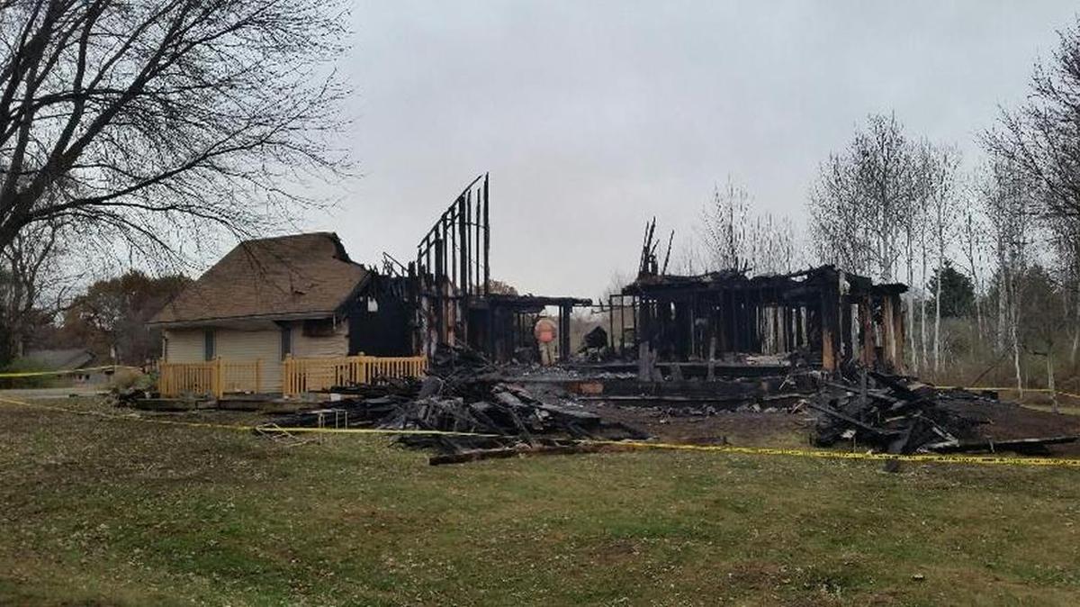 Six people were killed in a house fire in Dixon, shown here in a photo from the WIFR newsroom.