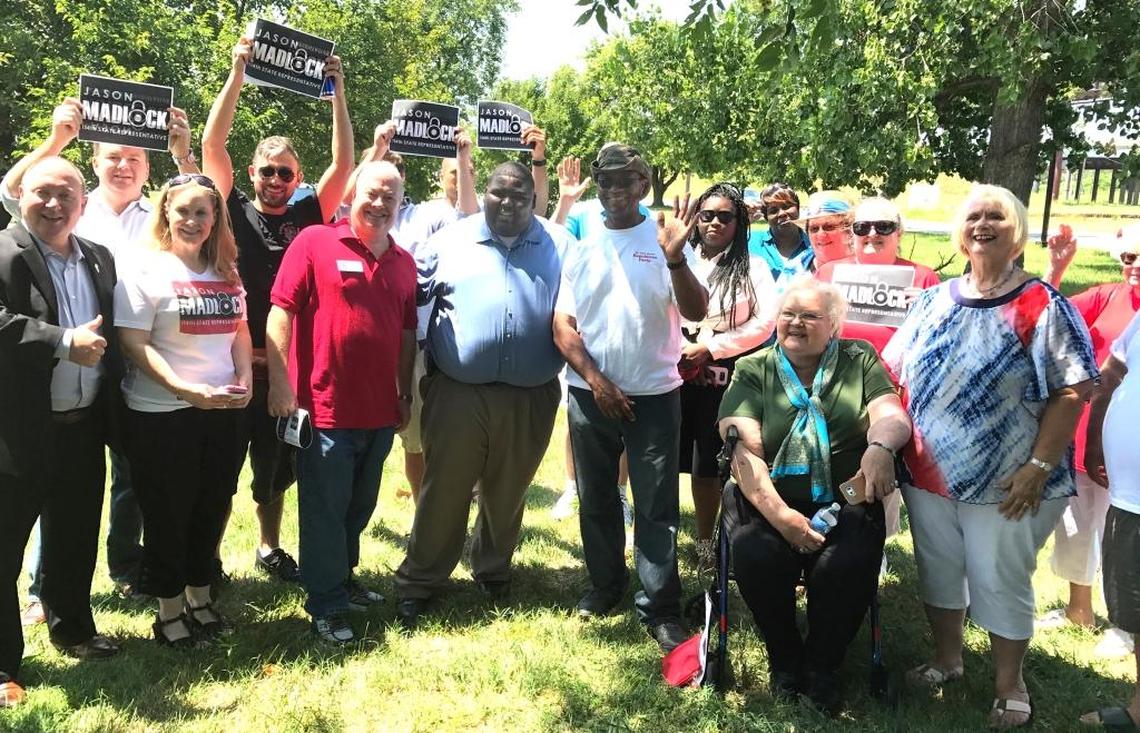 Supperters gathered as Jason Madlock, center, announced his candidacy for state representative in District 114.