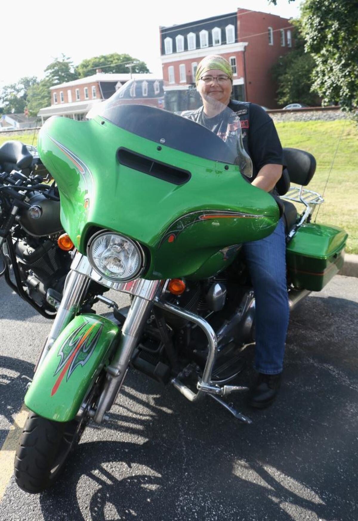 BACA president M&M sits on her motorcycle. “While we all have personal reasons for being here, we don’t focus so much on that. We’re all here to help these kids and empower them and help them heal from what’s happened.”