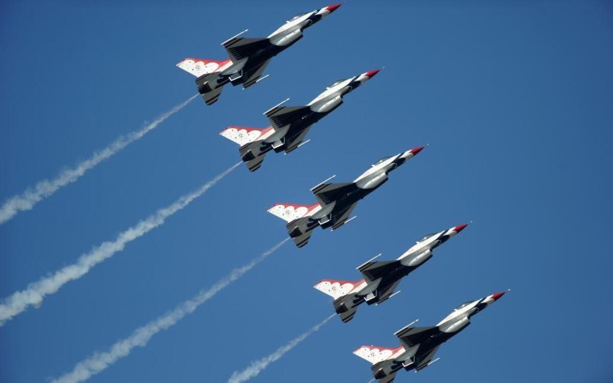 The U.S. Air Force Air Demonstration Squadron "Thunderbirds", perform the Line Abreast Loop during an air show at Tyndall Air Force Base, Fla., in March 2011. The Thunderbirds will appear at an air show at Scott Air Force Base the weekend of June 10-11.