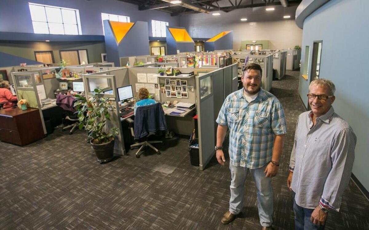 
Peer 151’s executive director Chris Oswald, left, and Kurt Artinger pose inside Replacement Services LLC that occupies a 13,000-square-foot space inside that used to be a gymnasium. Peer 151 is a new entrepreneurship development center being created inside the former Turner Hall and YMCA building downtown.
